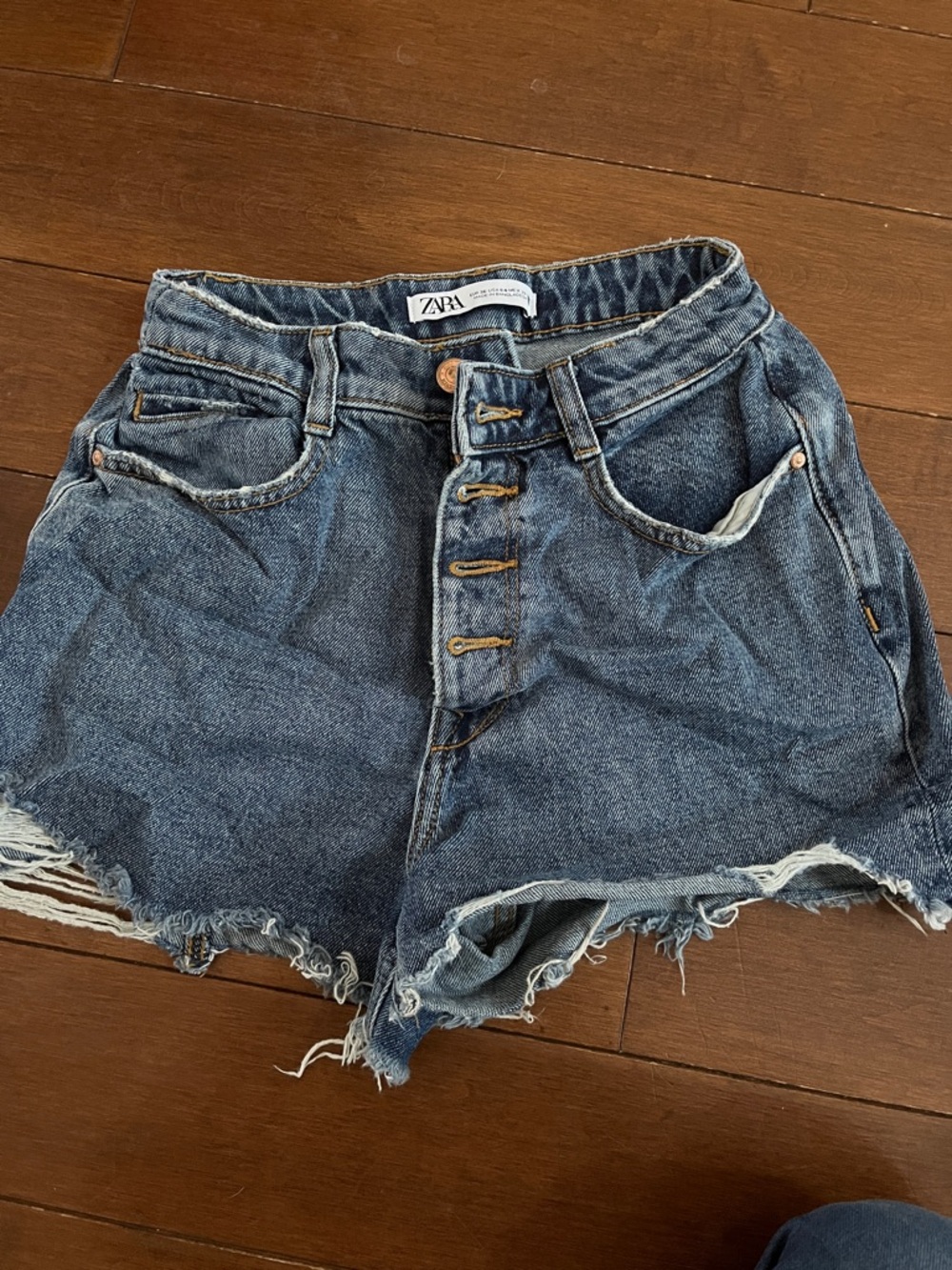 ZARA Button-Fly Distressed Denim Shorts in Blue